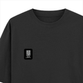 Oversized Standard T-Shirt | Unisex Relaxed Fit | 100% Super Combed Cotton DTG | Soft, Breathable & Durable | Adult | Personalized | DTG | Modern | Leadership | Confidence | Everyday | Calm - left pocket - Black - mockup 3