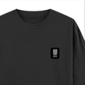 Oversized Standard T-Shirt | Unisex Relaxed Fit | 100% Super Combed Cotton DTG | Soft, Breathable & Durable | Adult | Personalized | DTG | Modern | Leadership | Confidence | Everyday | Calm - right pocket - Black - mockup 4