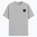 Basic T-Shirt | Unisex Fit, XS-2XL | Poly-Cotton Blend | Soft, Durable Everyday Wear | Unisex | Personalized | Embroidery | Bold Typography | Humor | Relationships | Everyday | Humorous - left pocket - Grey Melange - mockup 3