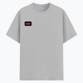 Basic T-Shirt | Unisex Fit XS-2XL | Poly-Cotton Blend Soft Finish | Durable Stitching Lycra Rib Neck | Adults | Personalized | DTG | Bold | Rebellion | Defiance | Everyday | Defiant - right pocket - Grey Melange - mockup 4