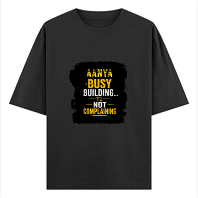 Oversized Classic T-Shirt | Unisex Oversized Fit | 100% Super-Combed Cotton | Pre-Shrunk & Ribbed Neck | Adults | Personalized | DTG | Typographic | Work Ethic | Success | Everyday | Motivational | Busy Building, Not Complaining - front - Black - mockup 1