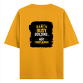 Oversized Classic T-Shirt | Unisex Oversized Fit | 100% Super-Combed Cotton | Pre-Shrunk & Ribbed Neck | Adults | Personalized | DTG | Typographic | Work Ethic | Success | Everyday | Motivational | Busy Building, Not Complaining - back - Golden Yellow - mockup 2