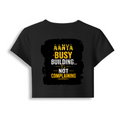 Female Baby Tee | Cropped Fitted | Cotton Spandex Blend | Pre-shrunk Stretch | Women's | Personalized | DTF | Typographic | Work Ethic | Success | Everyday | Motivational | Busy Building, Not Complaining - back - Black - mockup 2