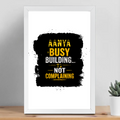 Framed Poster | Multiple Sizes & Frame Colors | 300 GSM Art Paper, Laminated | Fade-Proof Digital Print, Mounting Kit Included | Unisex | Personalized | Typographic | Work Ethic | Success | Everyday | Motivational | Busy Building, Not Complaining - front_12x18In - 12x18In - mockup 7