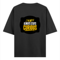 Oversized Standard T-Shirt | Unisex Relaxed Fit | 100% Super Combed Cotton DTG | Soft, Breathable & Durable | Adult | Personalized | DTG | Bold Typography | Self-improvement | Everyday | Empowering | Always Stay Curious - back - Black - mockup 2