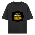 Oversized Standard T-Shirt | Unisex Oversized Fit | 180 GSM 100% Super Combed Cotton | DTF Print | Soft & Durable | Personalized | DTF | Bold Typography | Self-improvement | Everyday | Empowering | Always Stay Curious - front - Black - mockup 1