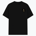 Basic T-Shirt | Unisex Fit | Poly-Cotton Blend | Soft Finish, Durable | Adults | Personalized | Typography | Royalty | Power | Everyday | Empowering | The Crowned Warrior - left pocket - Black - mockup 3
