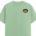 Male Classic Crew T-Shirt | Men's Regular Fit | 180 GSM Bio-Washed Cotton | Pre-Shrunk, Double-Stitched | Personalized | Typography | Bollywood | Movies | Everyday | Confident | Famous By - left pocket - Jade - mockup 3