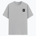Basic T-Shirt | Unisex Fit, Sizes XS-2XL | 180 GSM Poly-Cotton Blend, DTF Ready | Bio-Wash, Silicon Finish, Durable Stitching | Adults | Typographic - left pocket - Grey Melange - mockup 3