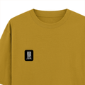Oversized Classic T-Shirt | Unisex Oversized Fit | 100% Super-Combed Cotton | Pre-Shrunk & Ribbed Neck | Adults | Typographic | Determination - left pocket - Mustard Yellow - mockup 3