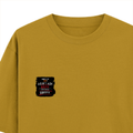Oversized Classic T-Shirt | Unisex Oversized Fit | 100% Super-Combed Cotton | Pre-Shrunk & Ribbed Neck | Adults | Personalized | DTG | Grunge | Coffee | Pop Culture (Bollywood) | Everyday | Playful | Uri: The Surgical Strike - left pocket - Mustard Yellow - mockup 3